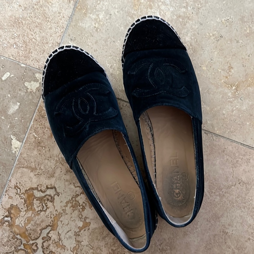 Dark blue Chanel slip ons